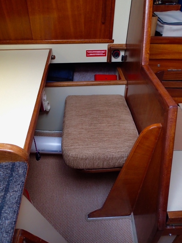 This support made a huge difference to the solidity of the port half-bulkhead. Now, it is as solid as the main bulkhead. It is made of 18mm marine ply varnished with teak-tinted varnish and bonded to both the floor and the bulkhead with epoxy thickened with high density West System filler.
