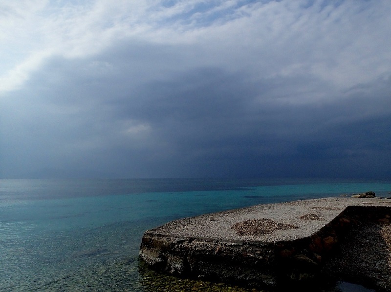 .Stormy, Caribbean-like clouds gather over Aegina.